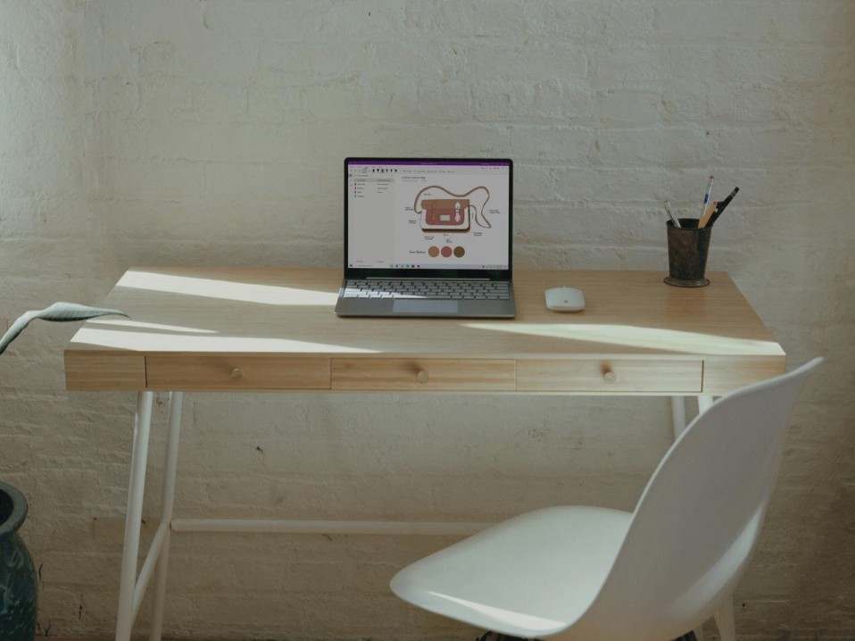 Floating desk with cable tray
